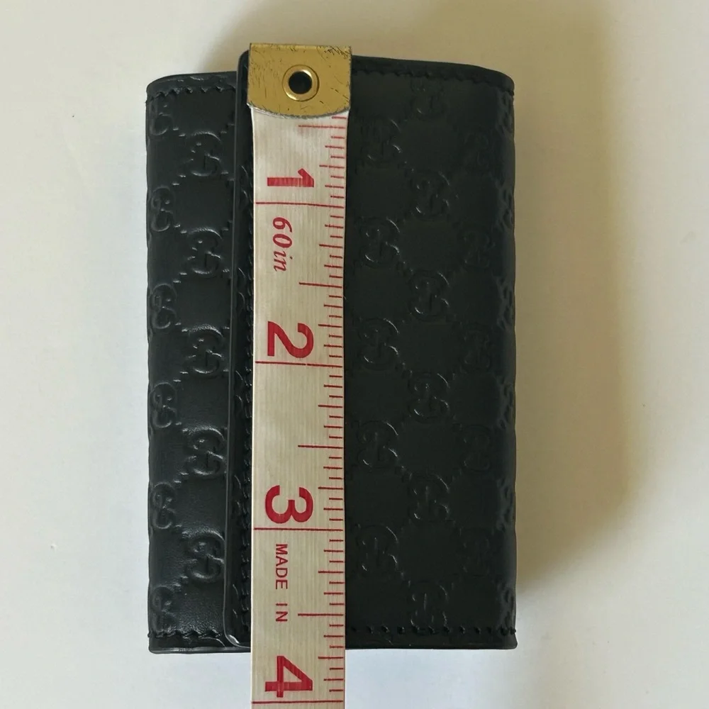 Gucci Black Microguccisima GG Logo Embossed Front closure Leather 6 Key Holder
